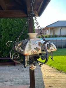 Forged chandelier with ceramics