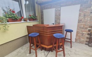 Bar counter, bar cabinet with mirror, three chairs