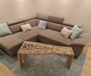 Design coffee table made of oak with an openwork pattern