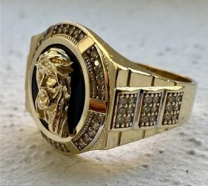 I am selling a gold men's ring with Jesus