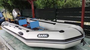 Bark inflatable boat for sale, white, hard floor. Almost new