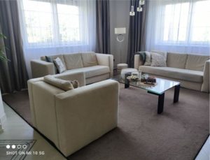 Novalife used but well-maintained beige sofa