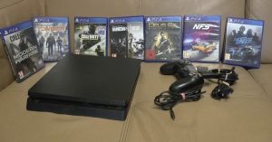 PS4 slim 1 TB + 7 games