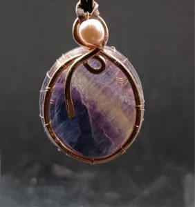 Medallion fluorite in copper in double-sided