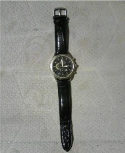 Tissot wristwatch (also shows date) in nice, well-maintained condition. Postal