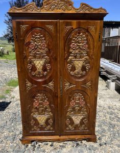 Massive carved cabinet