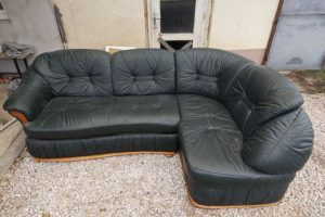 Original leather sofa can be converted into a bed, with bed linen holder