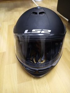 I am selling a flip-up motorcycle helmet LS2 size M